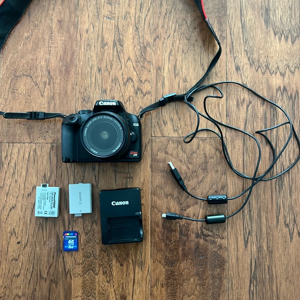 Canon EOS Rebel XS Digital SLR Camera Body with zoom lens 18-55mm